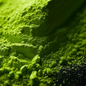 Close-up of vibrant green organic matcha powder with ultra-fine stone-milled texture.